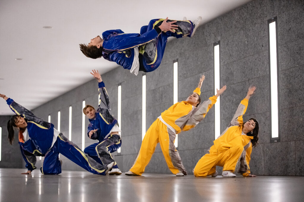 The Funky Monkeys performing an acrobatic dance routine